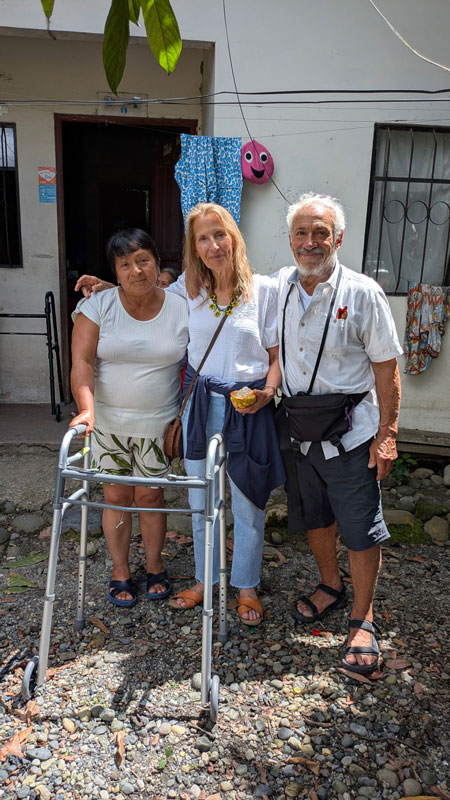 Janis and Steve the Founders Standing Next to a Lady with a Walker